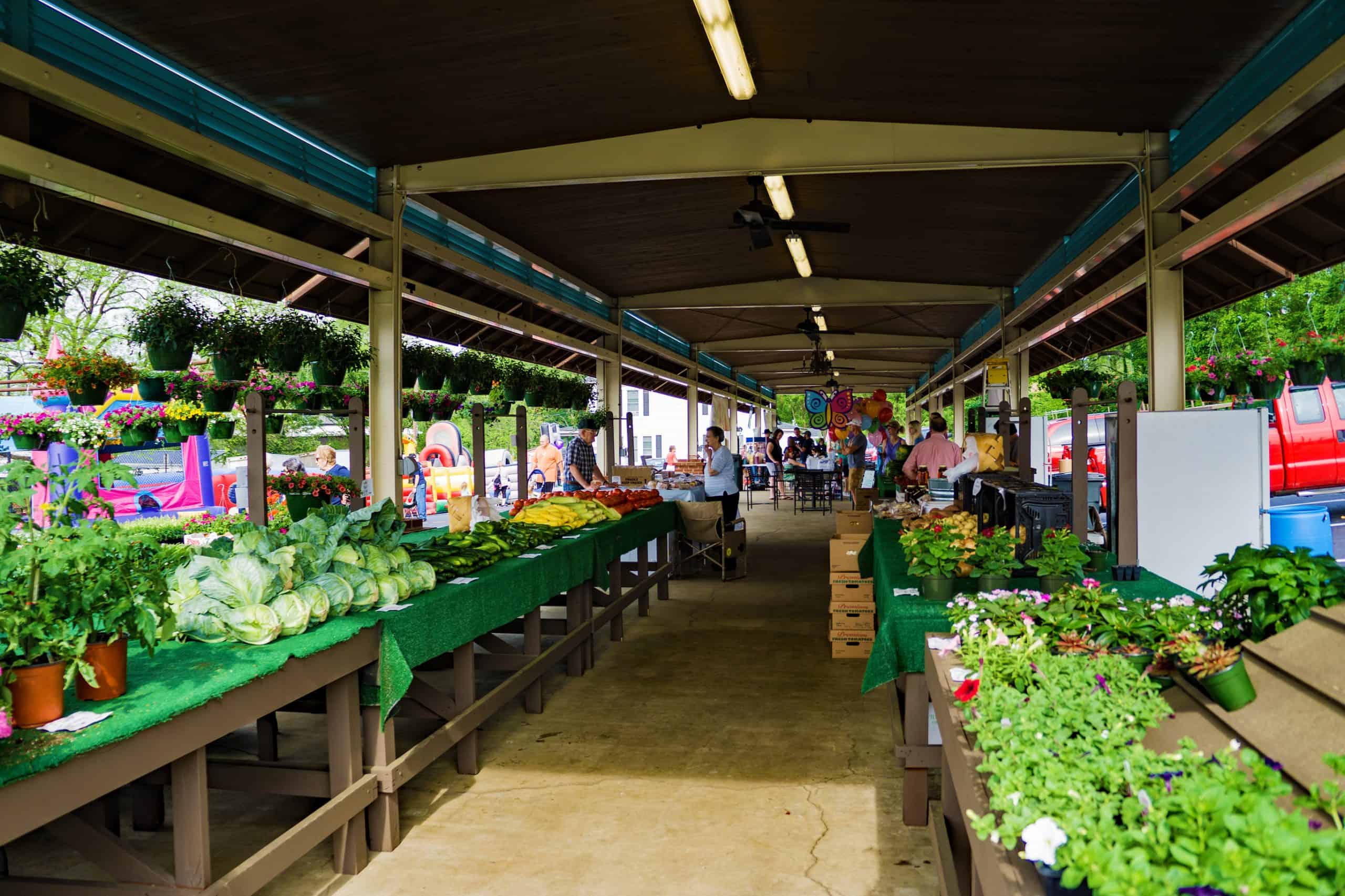 Produce stalls at a farmers market.