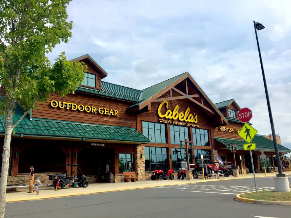 Cabela's outdoor gear store entrance with ATVs on display near Gainesville, Virginia