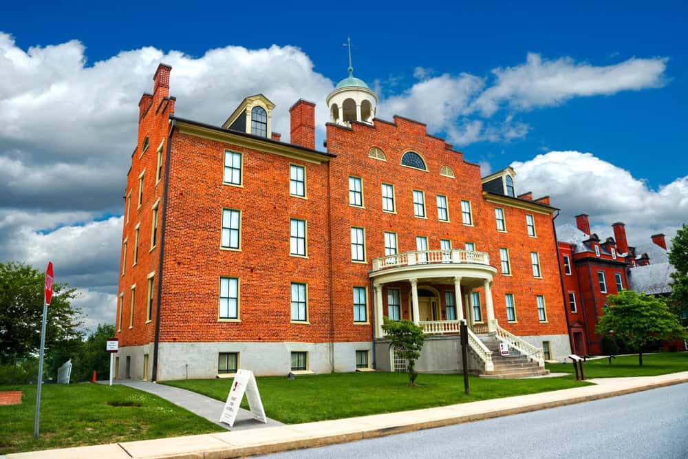 A large historic red brick institutional building with a domed cupola in Gettysburg, Pennsylvania.