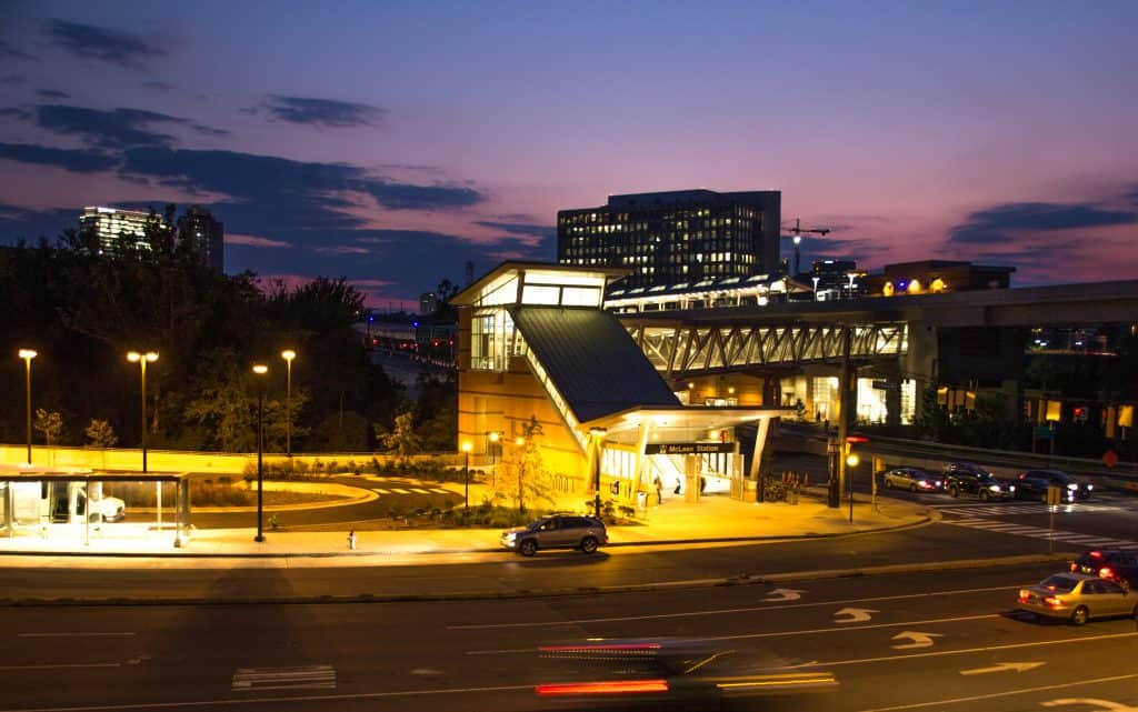 McLean Metro station at dusk with Tysons office towers behind
