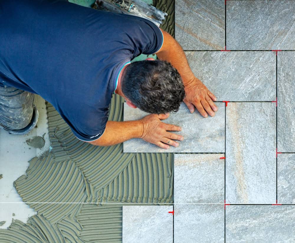Floor tile installation illustrating a flooring project