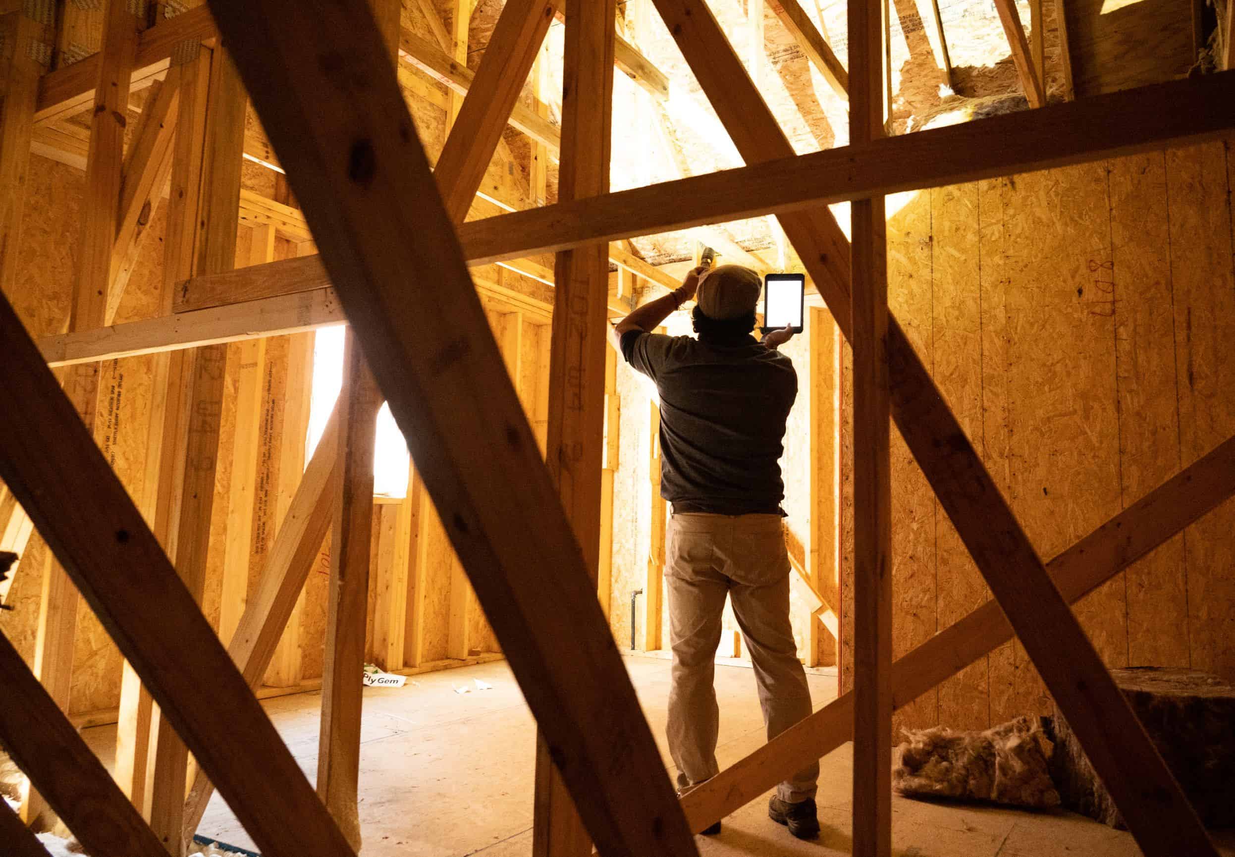 Certified NextDay Inspect Home Inspector reviewing residential property structure