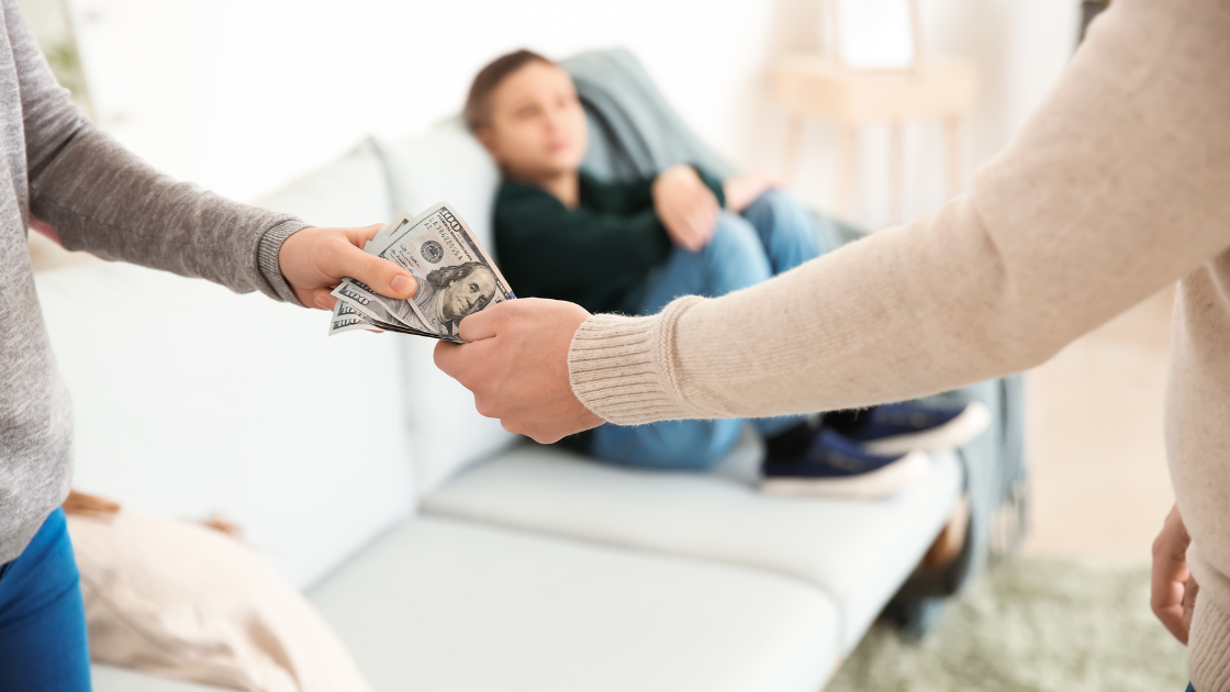 A man handing financial support to a woman representing Spousal support in Texas.
