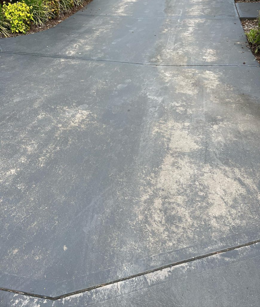 Concrete resurfacing Mount Martha before – worn concrete driveway prior to cleaning and resurfacing preparation