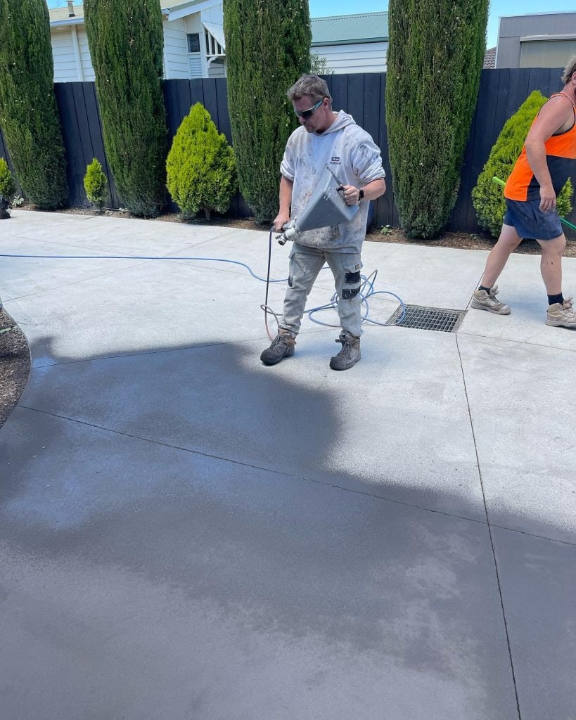 Mornington 2 Concrete resurfacing application in progress on driveway in Mornington