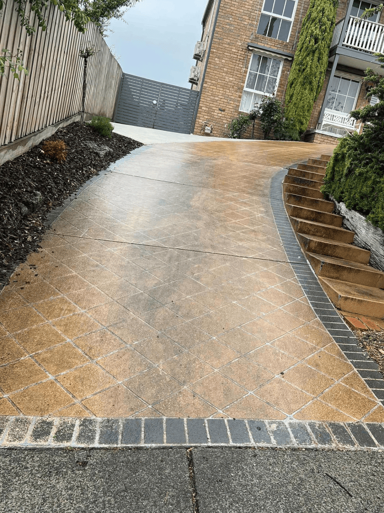 Before concrete driveway prior to resurfacing in Melbourne showing worn and outdated surface