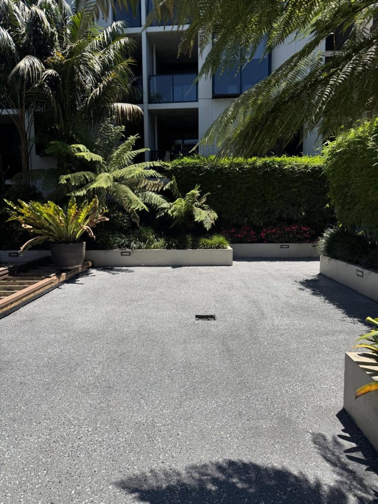 Exposed aggregate concrete resurfacing Melbourne residential pathway and entry area