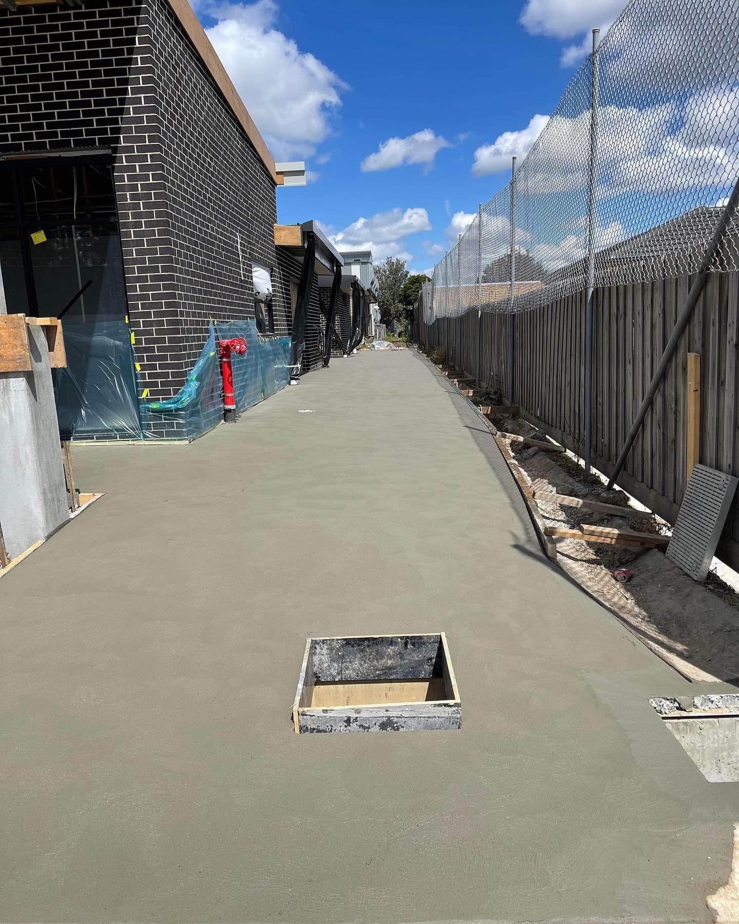 Merricks 4 Coloured concrete driveway