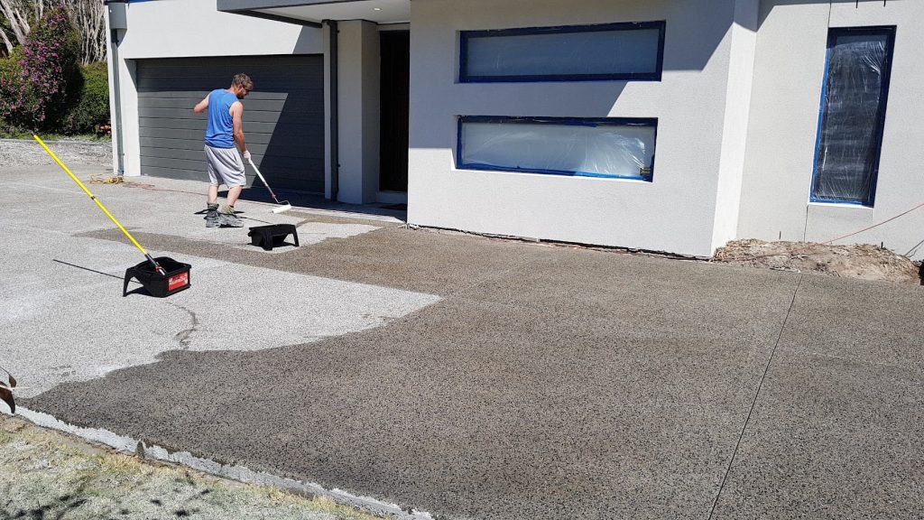 exposed aggregate concrete being sealed melbourne