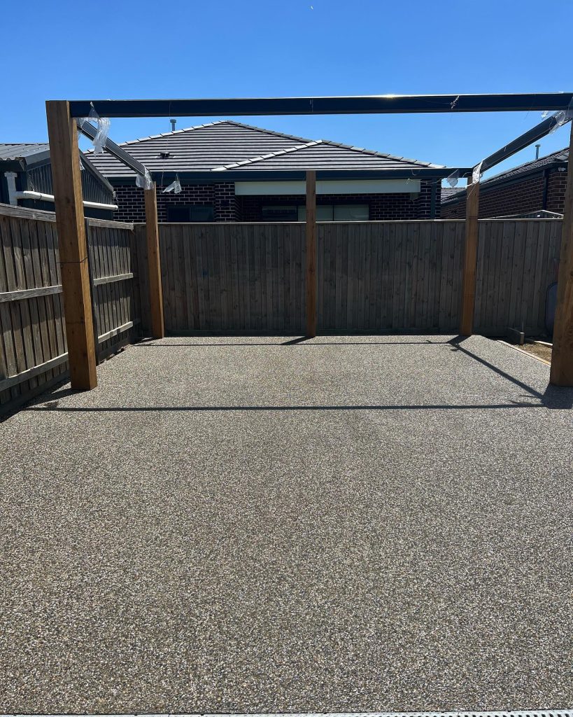 Exposed aggregate concrete entertaining area in Officer