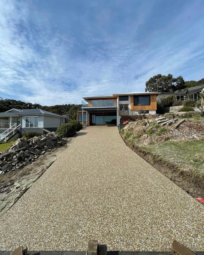 Exposed aggregate concrete driveway Melbourne long driveway finish