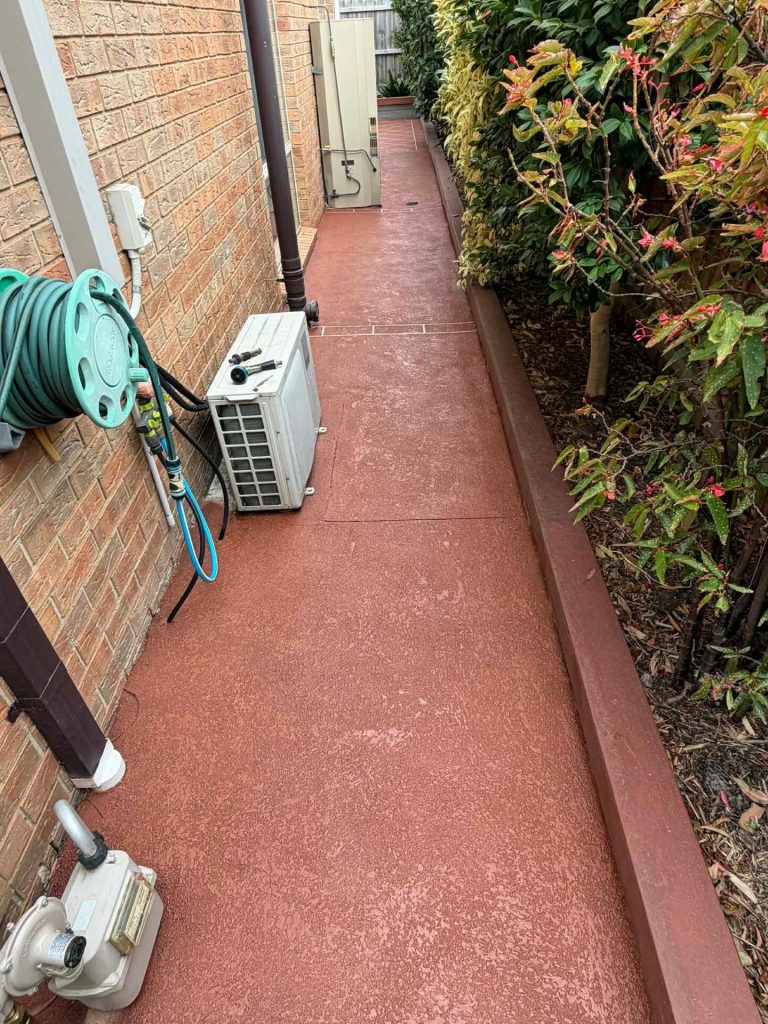 Cut stone stencil concrete pathway in Noble Park after pressure cleaning and resealing