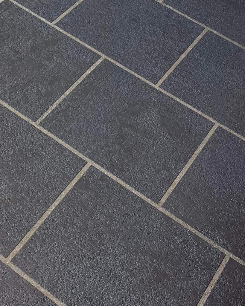 Decorative stencil concrete entryway in Safety Beach 22 years after resurfacing