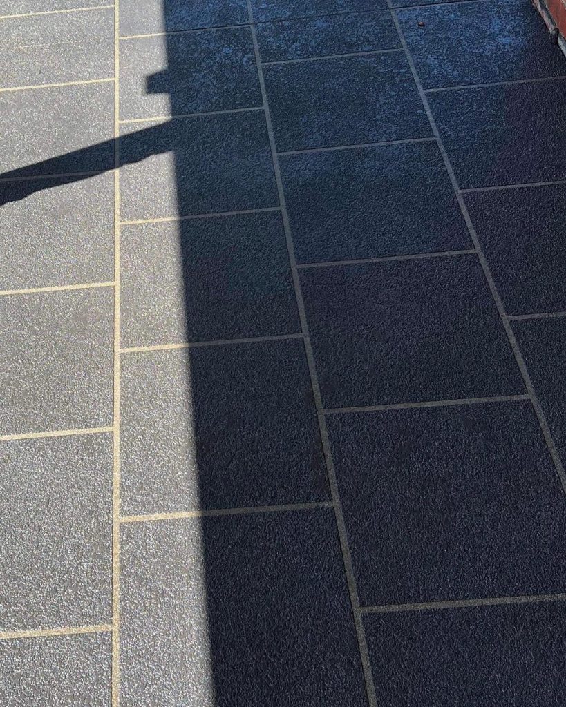 Stencil cut stone porch resurfacing in Safety Beach showing decorative concrete finish after 22 years