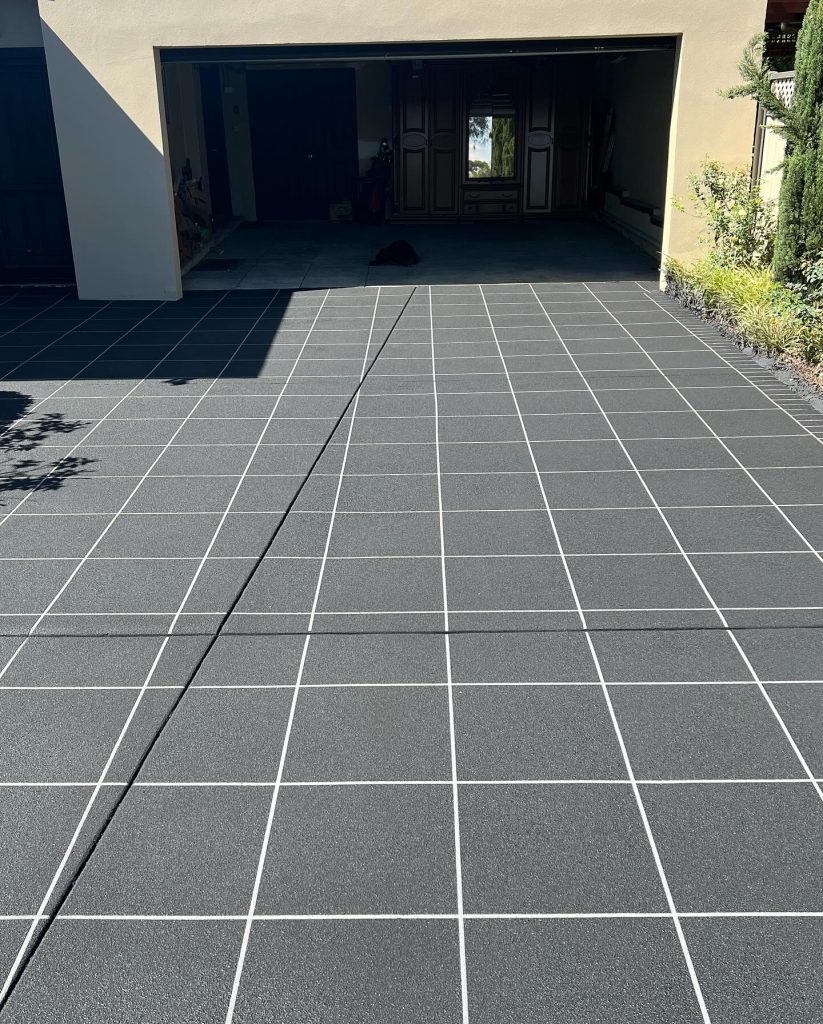 Tile pattern stencil concrete resurfacing driveway in Ferntree Gully photographed in 2024 during scheduled maintenance