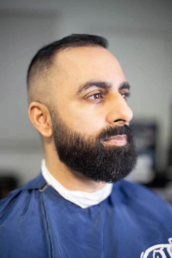 A fade haircut with a beard lineup service at the New York Barbershop in Gardena CA, 90249