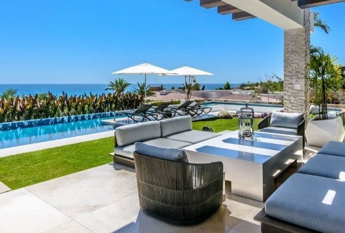 Contemporary Palmilla Villa With Shaded Outdoor Lounge, Sleek Infinity Pool, And Ocean Views In Los Cabos