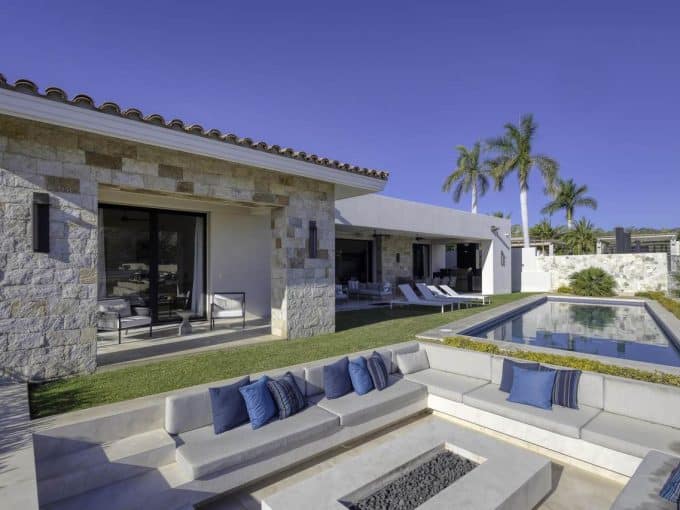 Luxurious Palmilla Beachfront Estate With Modern Design, Private Pool, Outdoor Lounge, And Tropical Landscaping, Perfect For Upscale Living And Relaxing In Paradise.