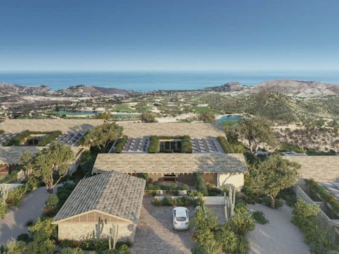 Palmilla Ocean View Estate With Lush Landscaping And Scenic Coastline In The Background.