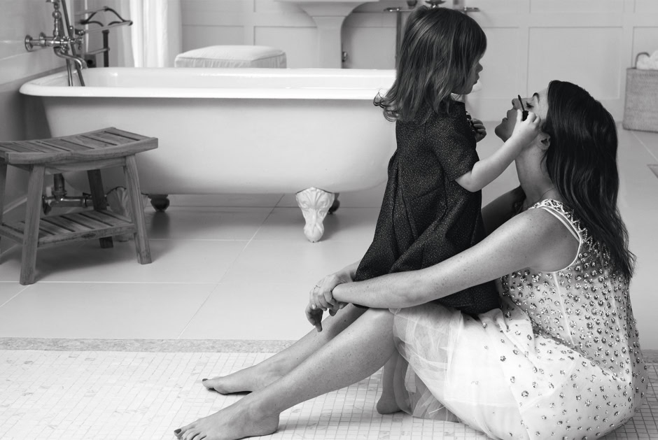 Elegant woman and young girl getting ready, woman applying makeup, intimate portrait, black and white photography, stylish makeup session, professional fashion makeup, Pamela Hanson Photography relevancy.