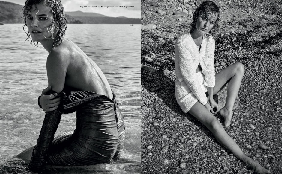 Elegant black and white photography of a woman by the water, showcasing wet hair and stylish clothing, emphasizing fashion and artistic portraiture.