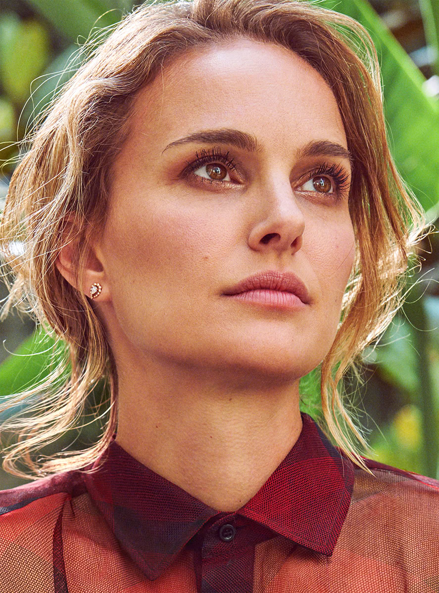 Confident woman portrait in nature, fashion photography by Pamela Hanson, showcasing natural beauty, professional photoshoot, outdoor setting, editorial style, high-resolution imagery.