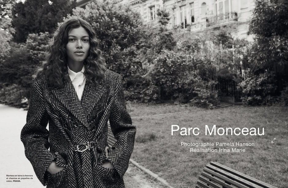 Elegant black-and-white portrait of a young woman with wavy hair in Parc Monceau, showcasing high fashion photography by Pamela Hanson for a sophisticated outdoor fashion shoot.
