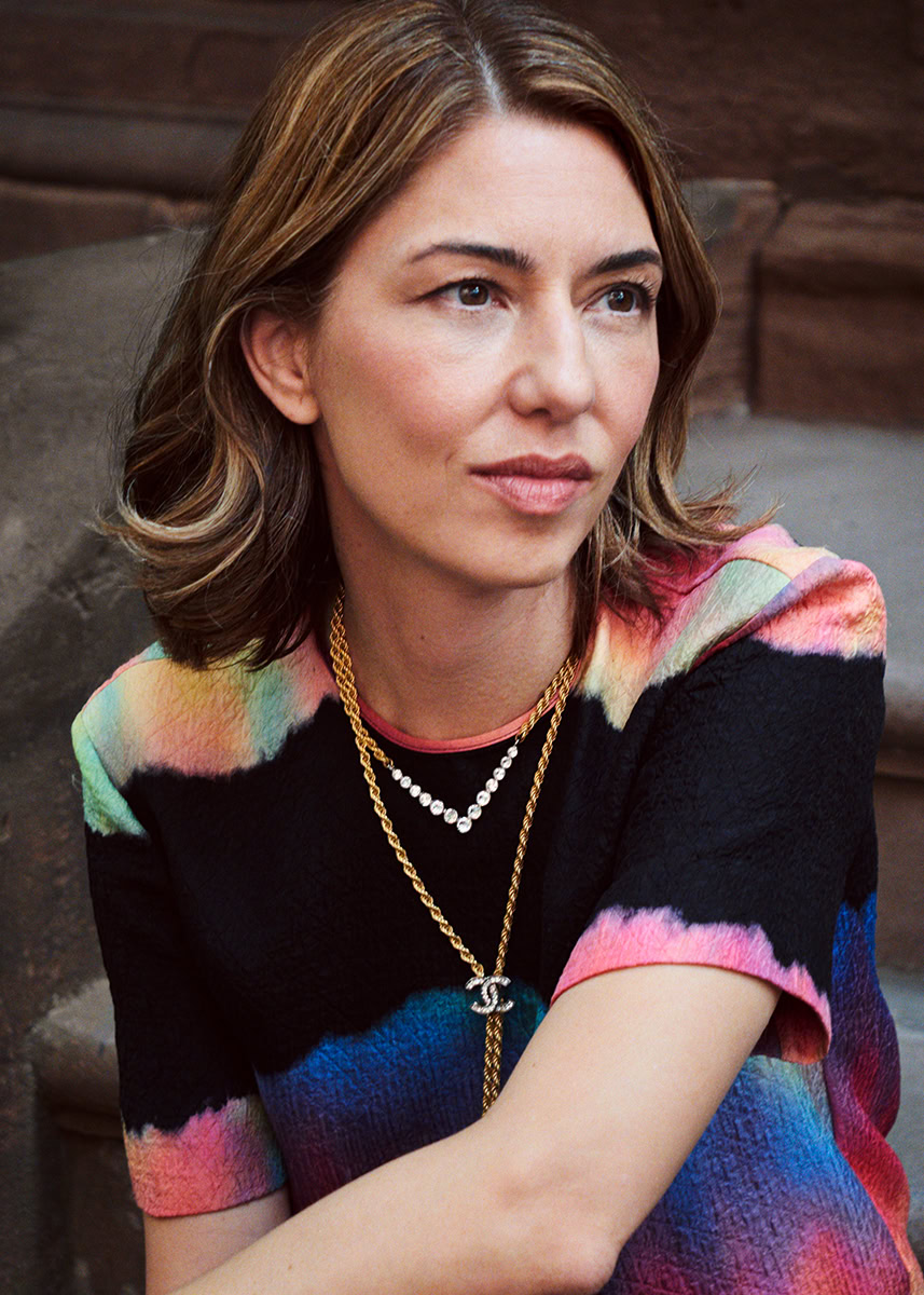 Elegant female portrait featuring colorful fashion, jewelry, and professional photography by Pamela Hanson.