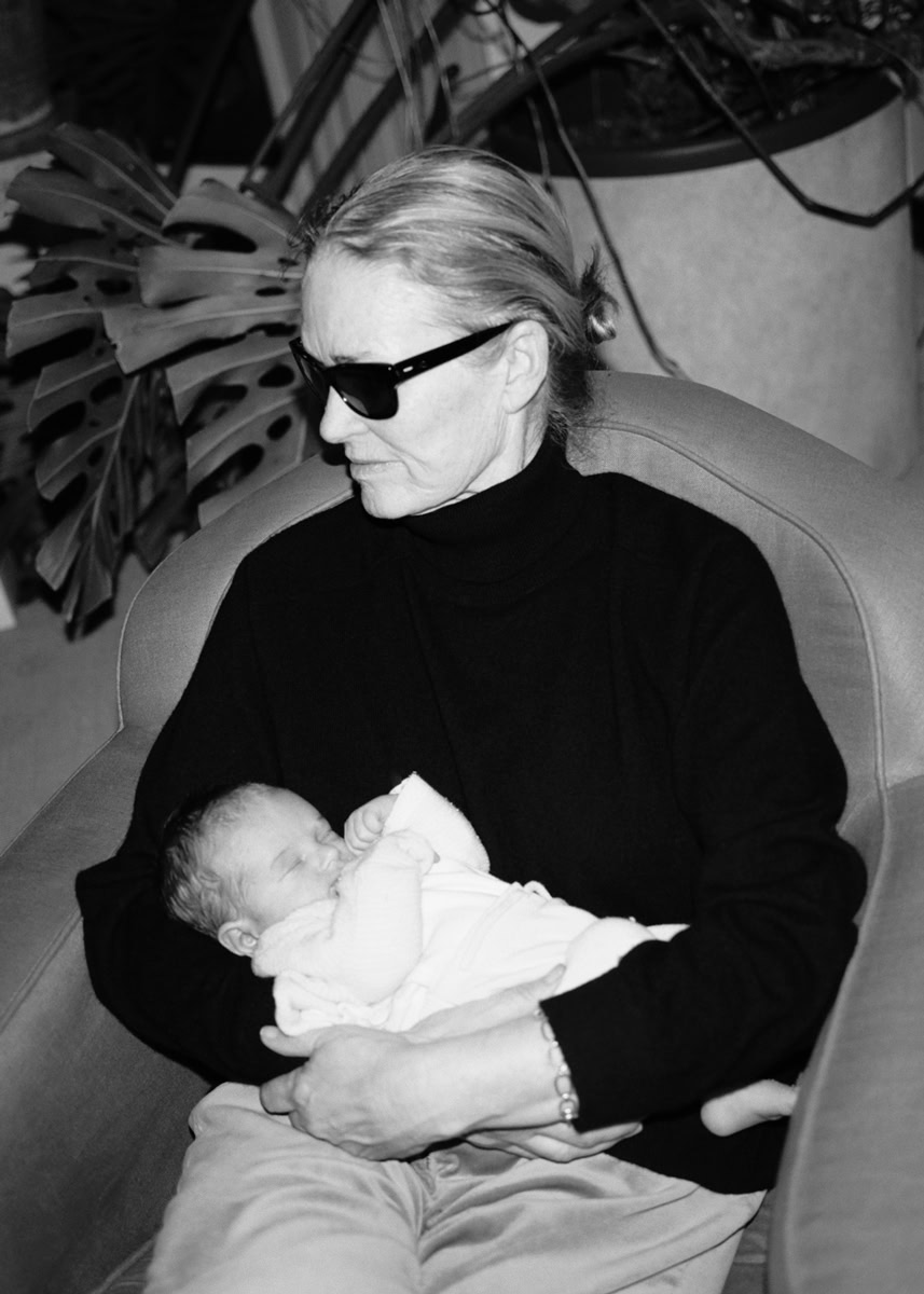 Aging mother holding newborn baby, black and white portrait, tender moment, fine art photography, emotional family connection, Pamela Hanson Photography.