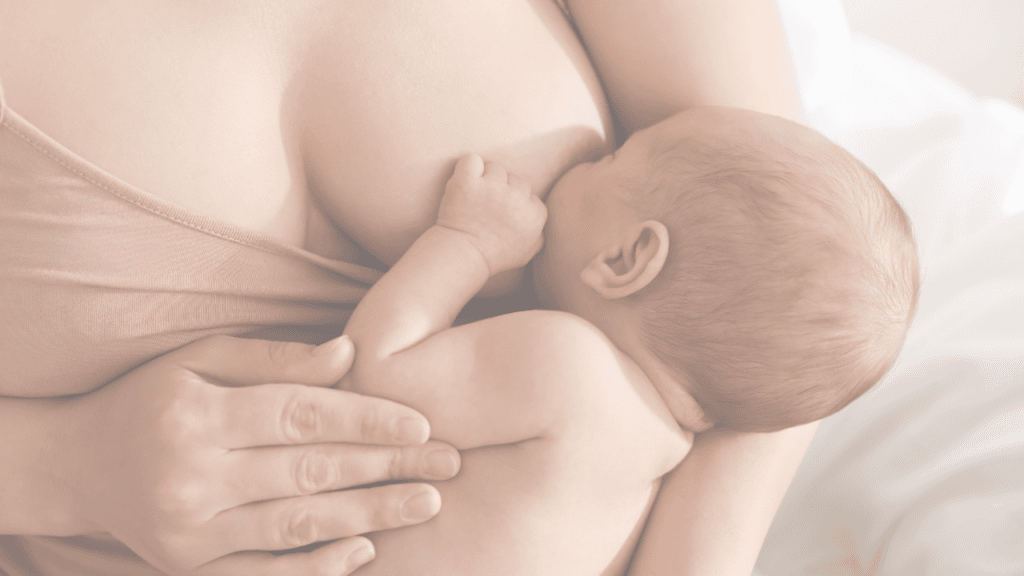A mother breastfeeding her newborn