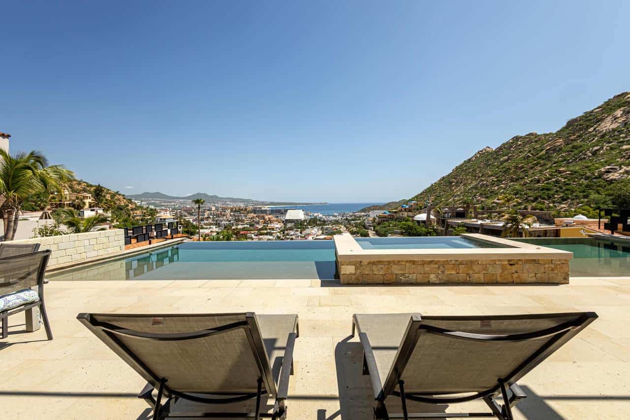 Stunning Pedregal Home Overlooking City And Ocean Views With A Luxurious Infinity Pool And Modern Outdoor Lounge Area. Perfect For Relaxing And Enjoying Baja California'S Beautiful Scenery.