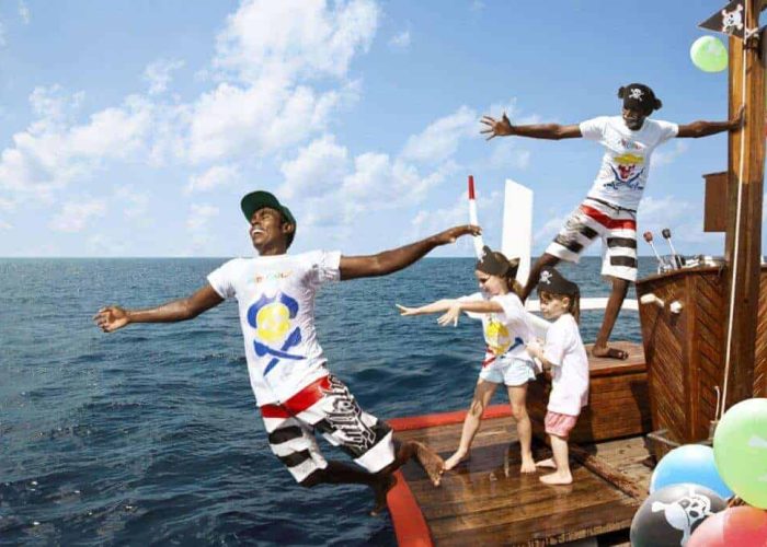 Family &Amp; Kids β Homes For Sale In Pedregal 1. Pedregal Real Estate Oceanfront Boat Party With Happy Family Enjoying Sunny Day At Sea, Colorful Balloons, And Summer Fun In A Luxurious Coastal Setting.