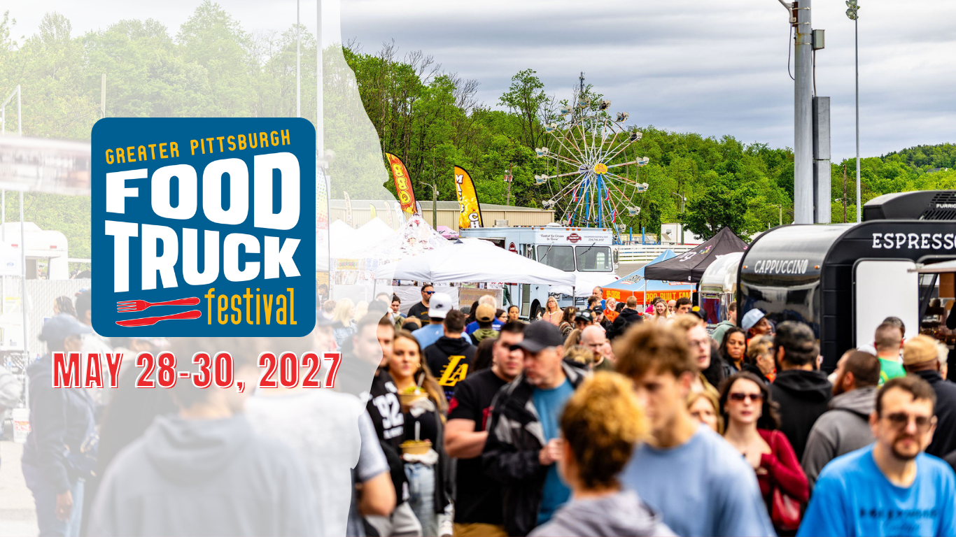 Food truck chef grilling at the Greater Pittsburgh Food Truck Festival.