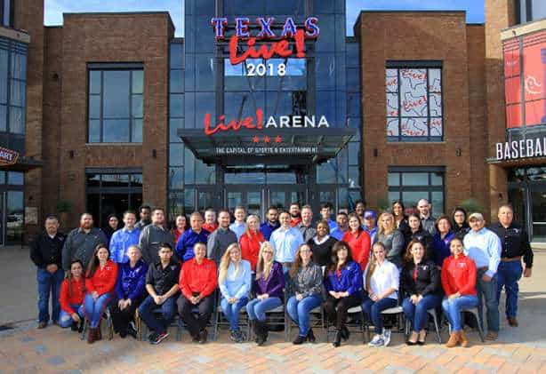 P&H Casters team photo outside Texas Live! Arena, showcasing company staff and leadership.