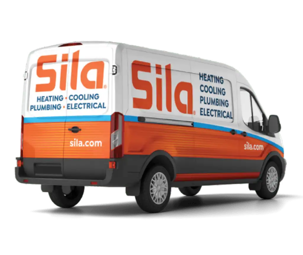 White and orange van with "Sila" branding, advertising heating, cooling, plumbing, and electrical services. The website "sila.com" is visible on the side.