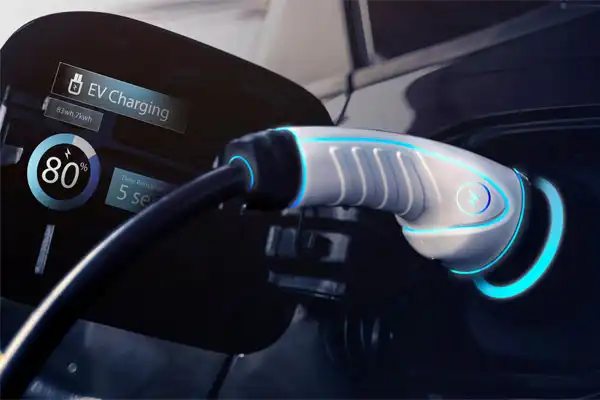 Electric car charging with cable connected, close-up view in Philadelphia. Display shows 80% charge level and remaining time.