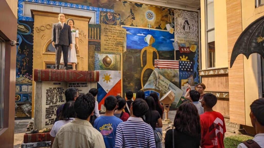 Students admiring the display at the Book Museum cum Ethnology Center