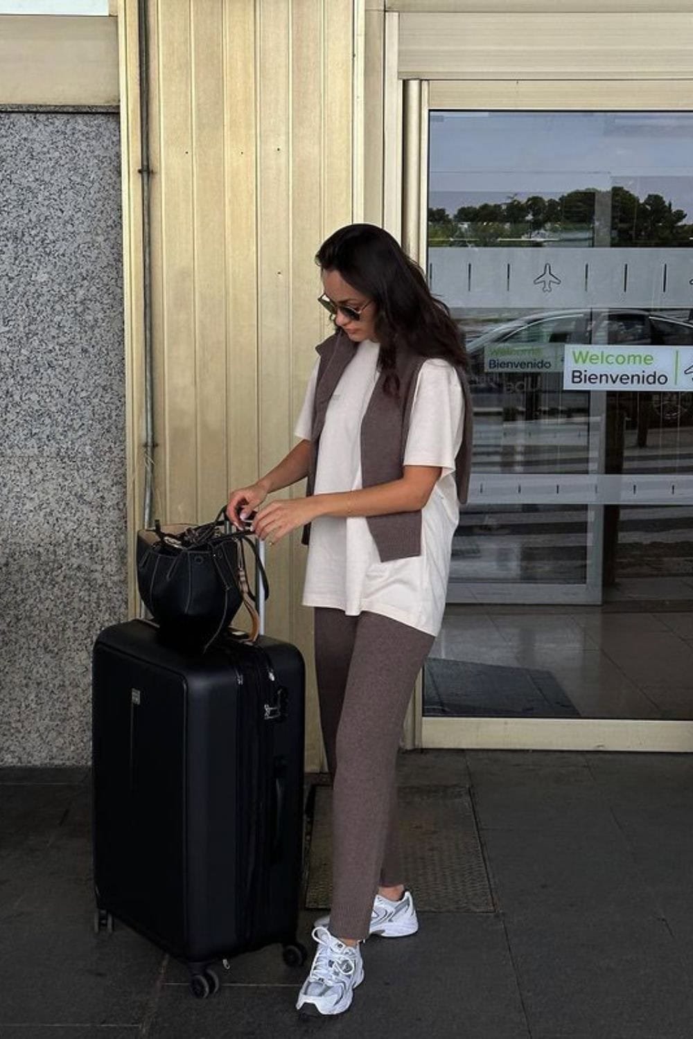 Airport travel outfit ideas summer brown bootcut joggers