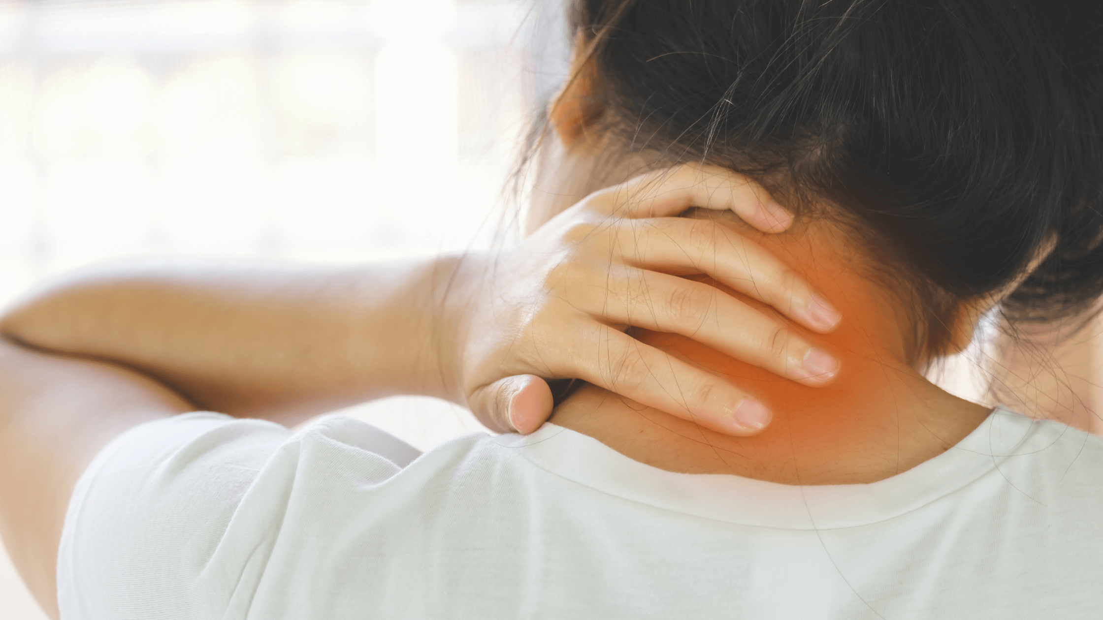 A woman holds the back of her neck, with a red glow showing the pain area, illustrating chronic neck discomfort that can be treated by procedures like ESI or Rhizotomy (RFA).