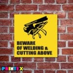 Welding Cutting Above Sign