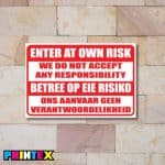 Enter at Own Risk Business Sign