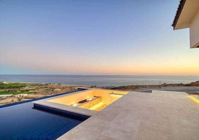 Stylish Modern Terrace With Covered Lounge, Built-In Grill, Plunge Pool, And Panoramic Pacific Ocean Views In Quivira Real Estate, Cabo San Lucas.