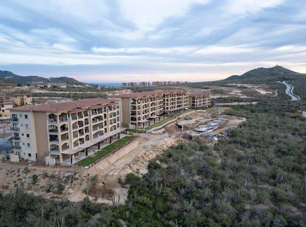 Quivira Los Cabos Ocean View Villas Under Construction With Scenic Landscape.