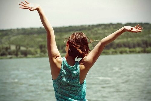 Raw Horizons outdoor lakeside scene with woman enjoying nature