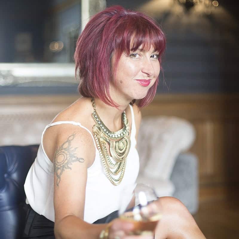Raw Horizons Woman with Red Hair and Jewelry
