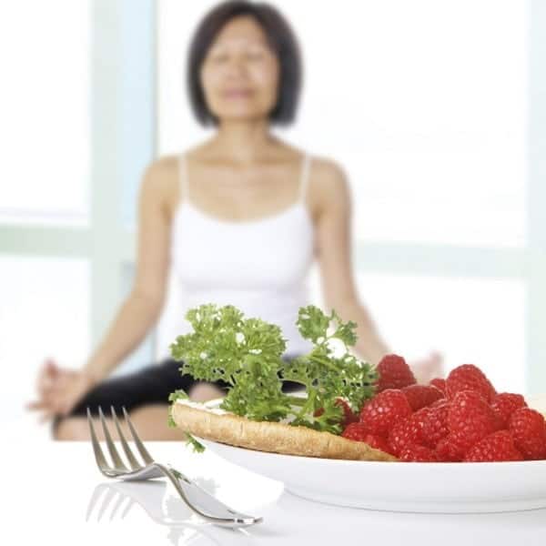 Fresh Raspberries and Green Herb on a Plate