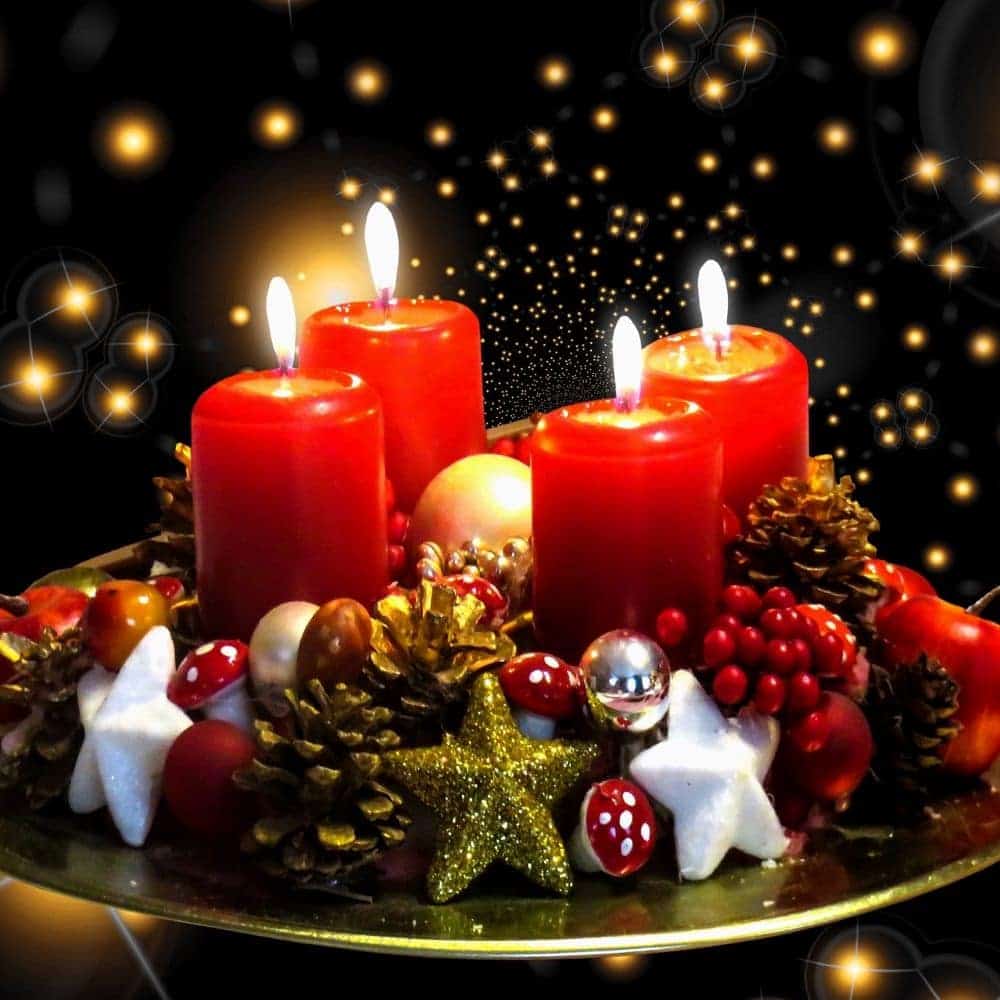 Red Candle Advent Wreath with Christmas Decorations and Sparkling Lights