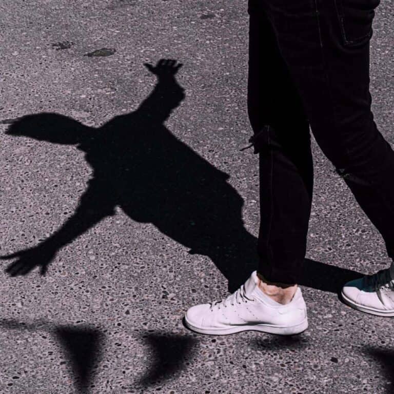 Balance and Shadow Reflection on Street