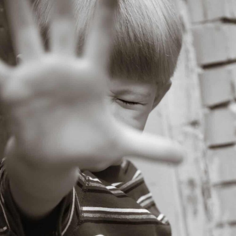 Disgusted Child Covering Face