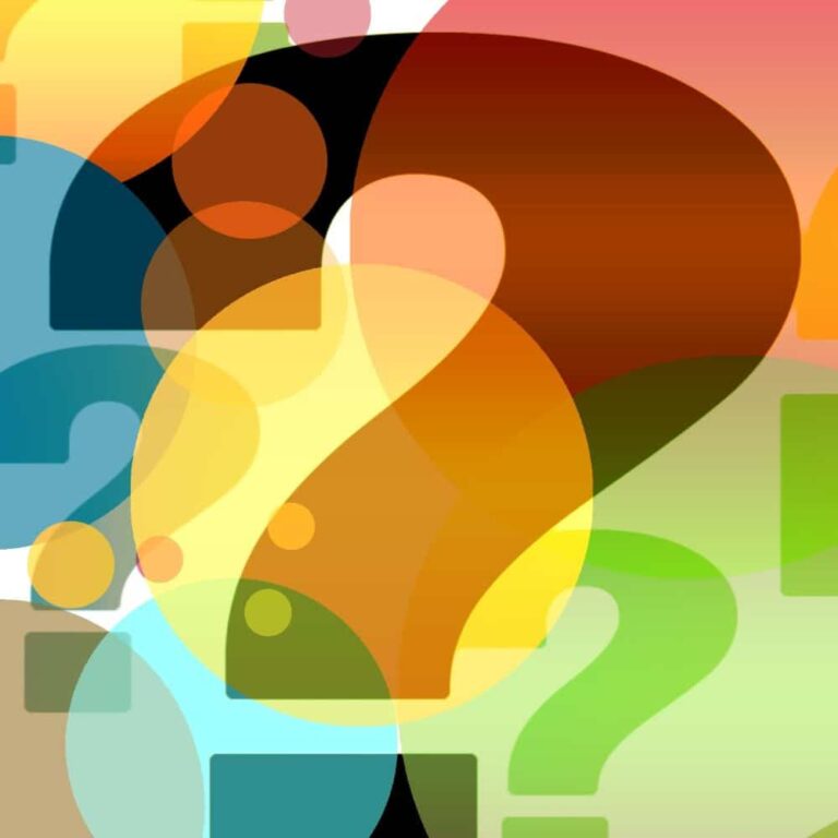 Provoking question marks in vibrant colors symbolizing inquiry and curiosity in health and wellbeing coaching.
